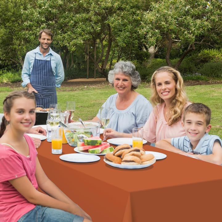 YIDAKO 12-Pack Orange Disposable Plastic Tablecloths for Rectangle Tables - Waterproof 54x108 Inches