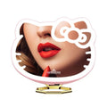 Impressions Vanity Hello Kitty 3X Magnifying Pocket Mirror with Stand, Adjustable Brightness Daylight LED Lighted Compact Makeup Mirror for Desk, Travel, Purse (Pink)