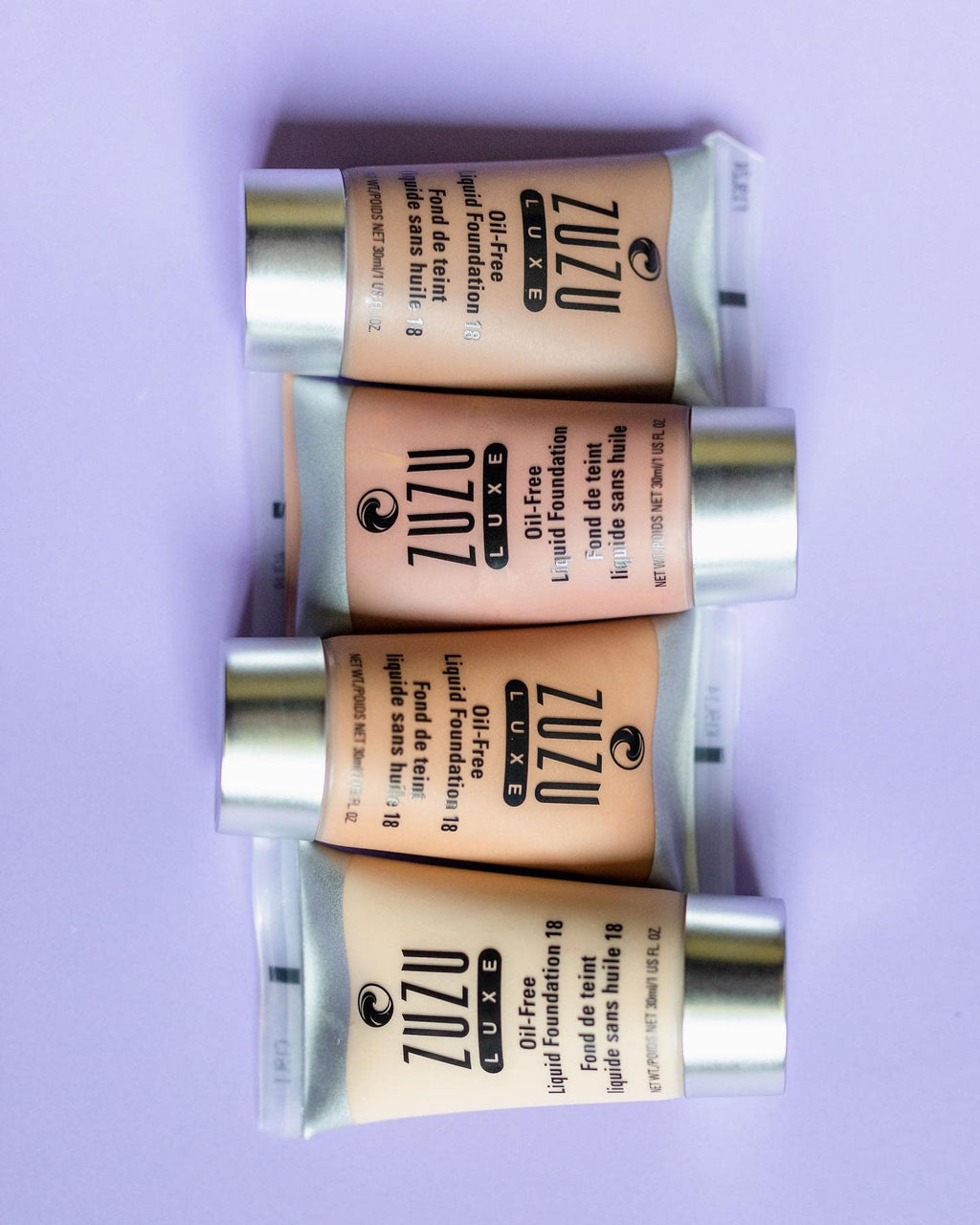 Zuzu Luxe,Oil Free Liquid Foundation (L -4),1 fl oz,Infused with vitamins A and E,contains aloe to keep skin supple and resilient. Natural, Paraben Free, Vegan, Gluten-free, Cruelty-free, Non GMO.