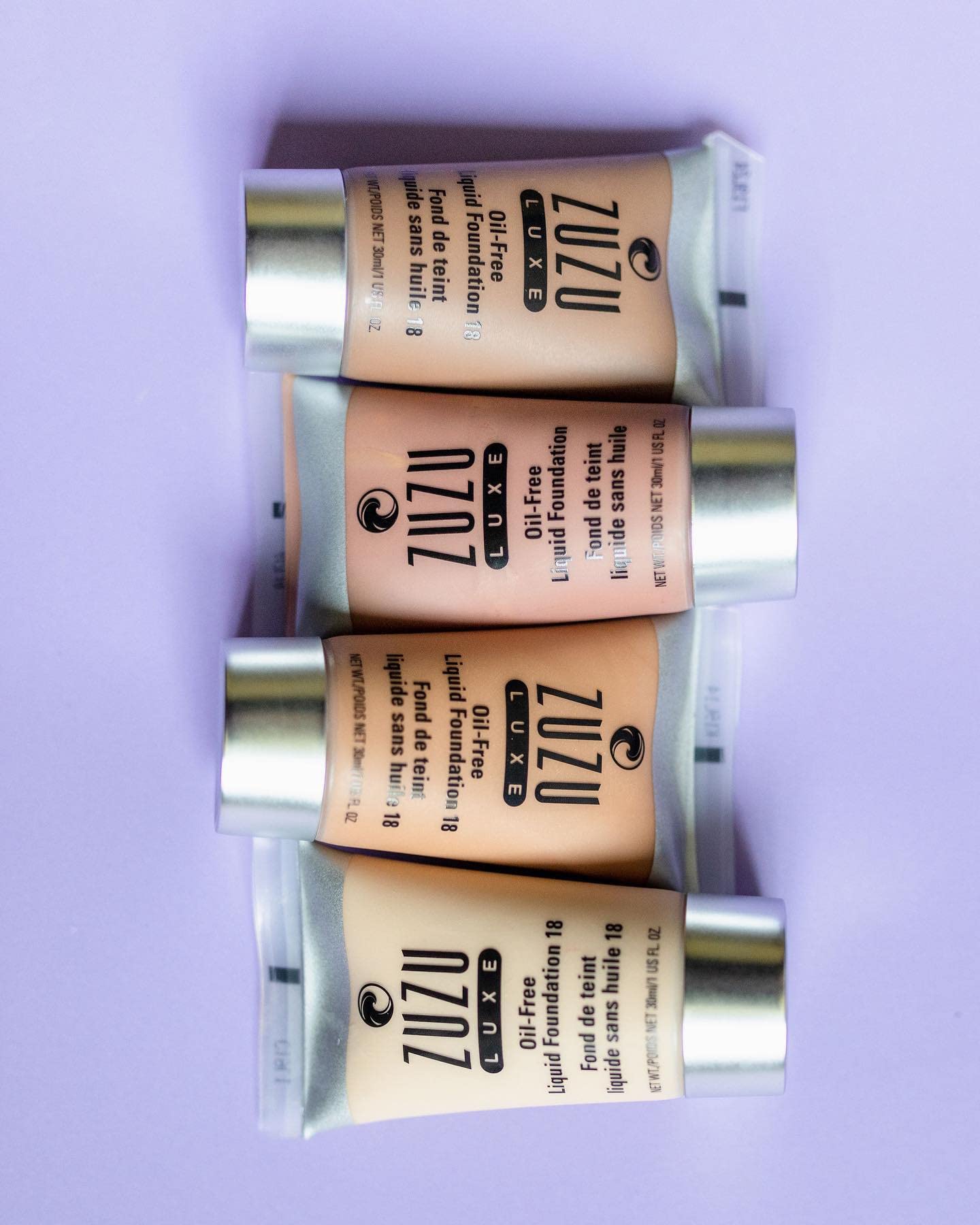 Zuzu Luxe,Oil Free Liquid Foundation (L -4),1 fl oz,Infused with vitamins A and E,contains aloe to keep skin supple and resilient. Natural, Paraben Free, Vegan, Gluten-free, Cruelty-free, Non GMO.