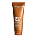 Clarins Self-Tanning Milky Lotion - Buildable, Streak-Free Tanner for Face & Body | 4.5 Ounces, Natural Glow