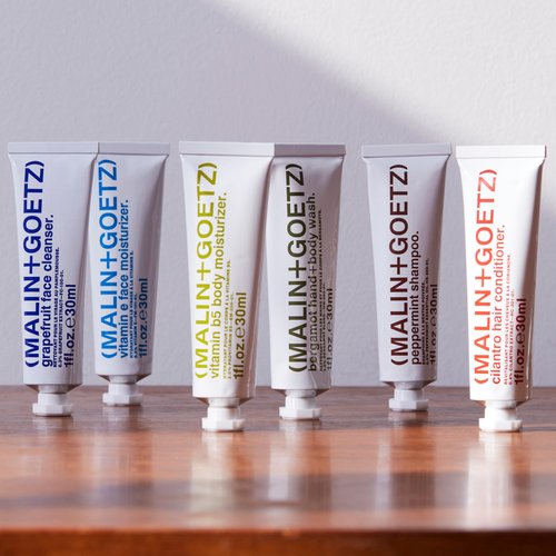 MALIN+GOETZ Best-Sellers Travel Kit | Six Everyday Essentials for Face, Body + Hair | Grapefruit Face Cleanser, Vitamin E Face Moisturizer, Peppermint Shampoo + More | Vegan, Travel-Friendly(6 x 1 oz)