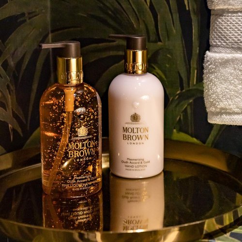 Molton Brown Oudh Accord & Gold Hand Lotion - Luxurious Moisturizing Formula | 10 Fl. Oz.