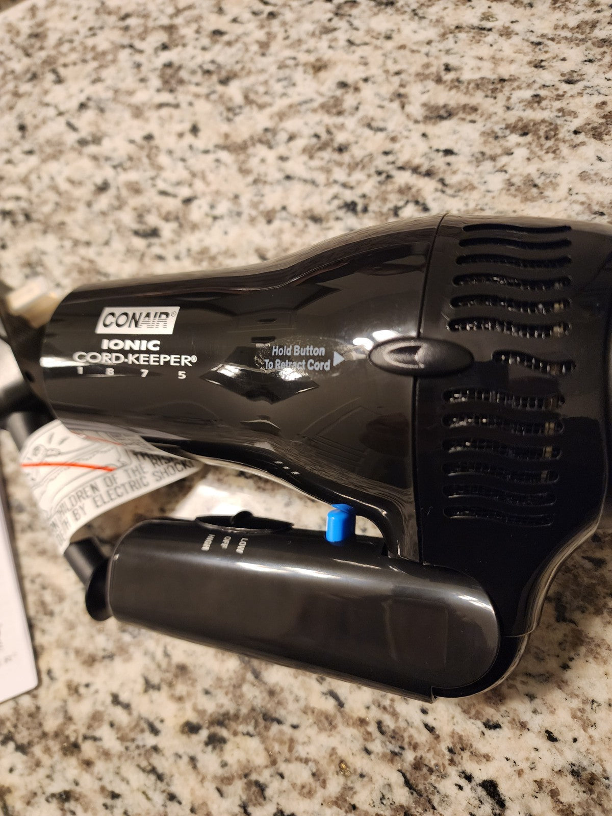 Travel-Size 1875W Cord Keeper Hair Dryer with Folding Handle & Retractable Cord