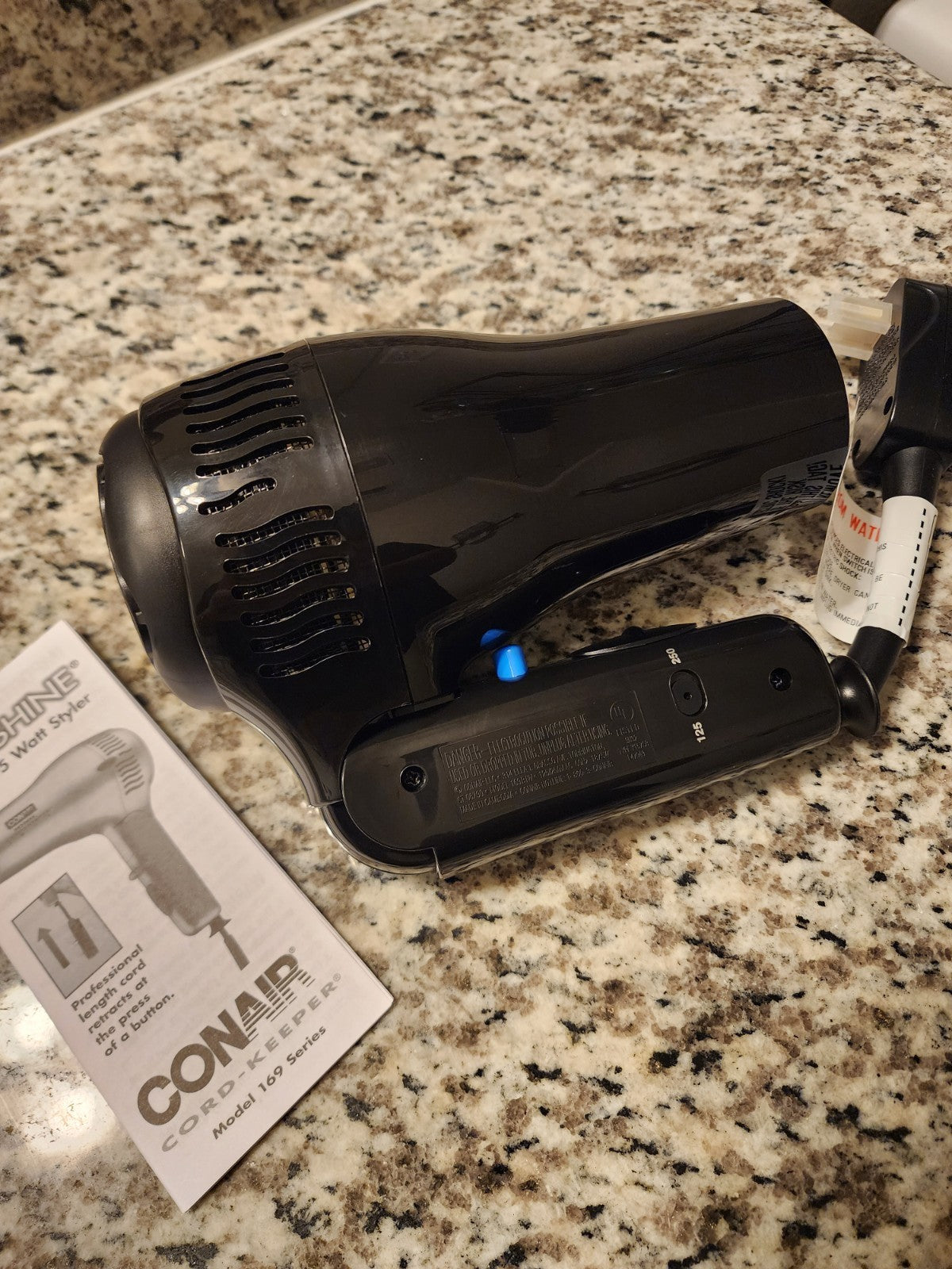 Travel-Size 1875W Cord Keeper Hair Dryer with Folding Handle & Retractable Cord