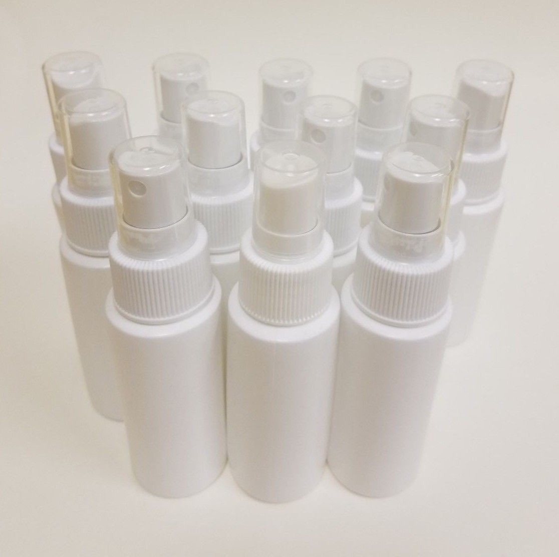 12 Pack 2oz Plastic Spray Bottles with Fine Mist Sprayers