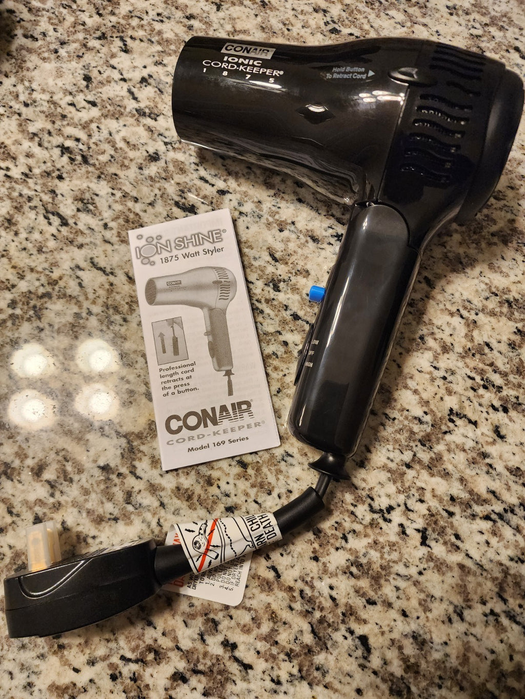 Travel-Size 1875W Cord Keeper Hair Dryer with Folding Handle & Retractable Cord